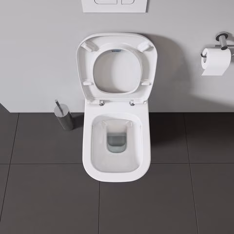 Sedile WC DURAVIT bianco con meccanismo di chiusura ammortizzata e cerniere in plastica.