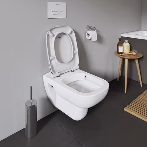 Sedile WC DURAVIT bianco con meccanismo di chiusura ammortizzata e cerniere in plastica.