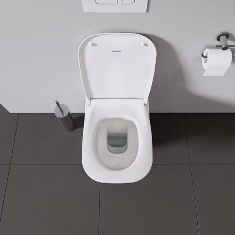 Sedile WC DURAVIT bianco con meccanismo di chiusura ammortizzata e cerniere in plastica.